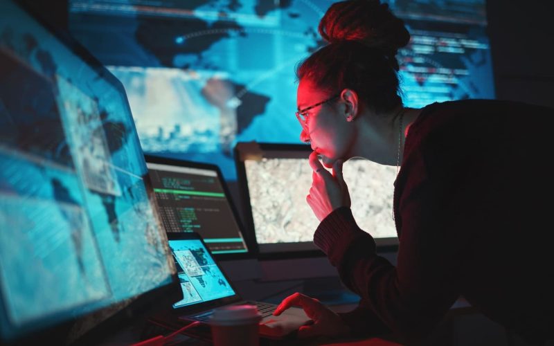 focused-woman-working-with-multiple-computer-scree-2026-03-25-03-30-58-utc